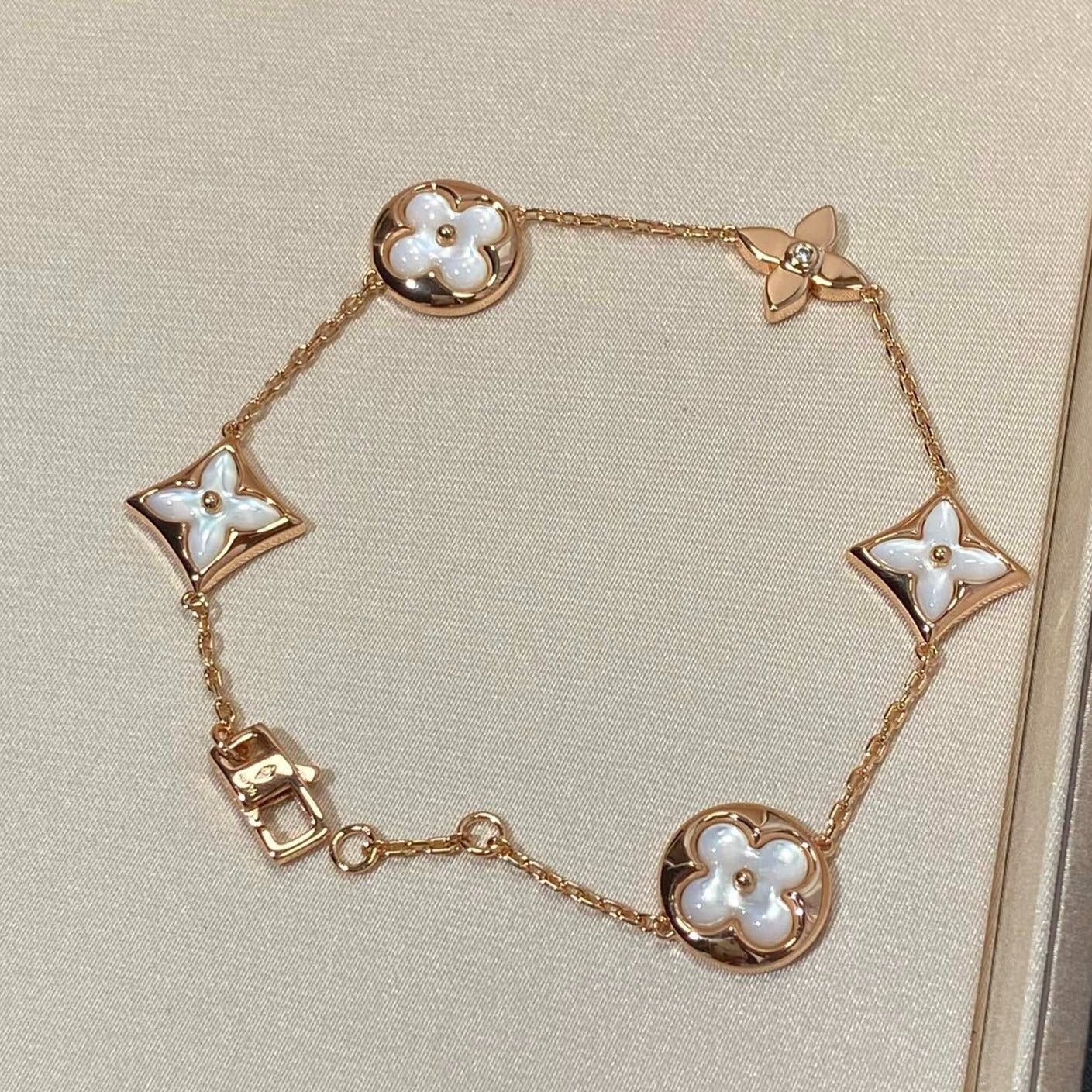 [Glimmer]STAR AND SUN 5 MOTIF MOP PINK GOLD BRACELET