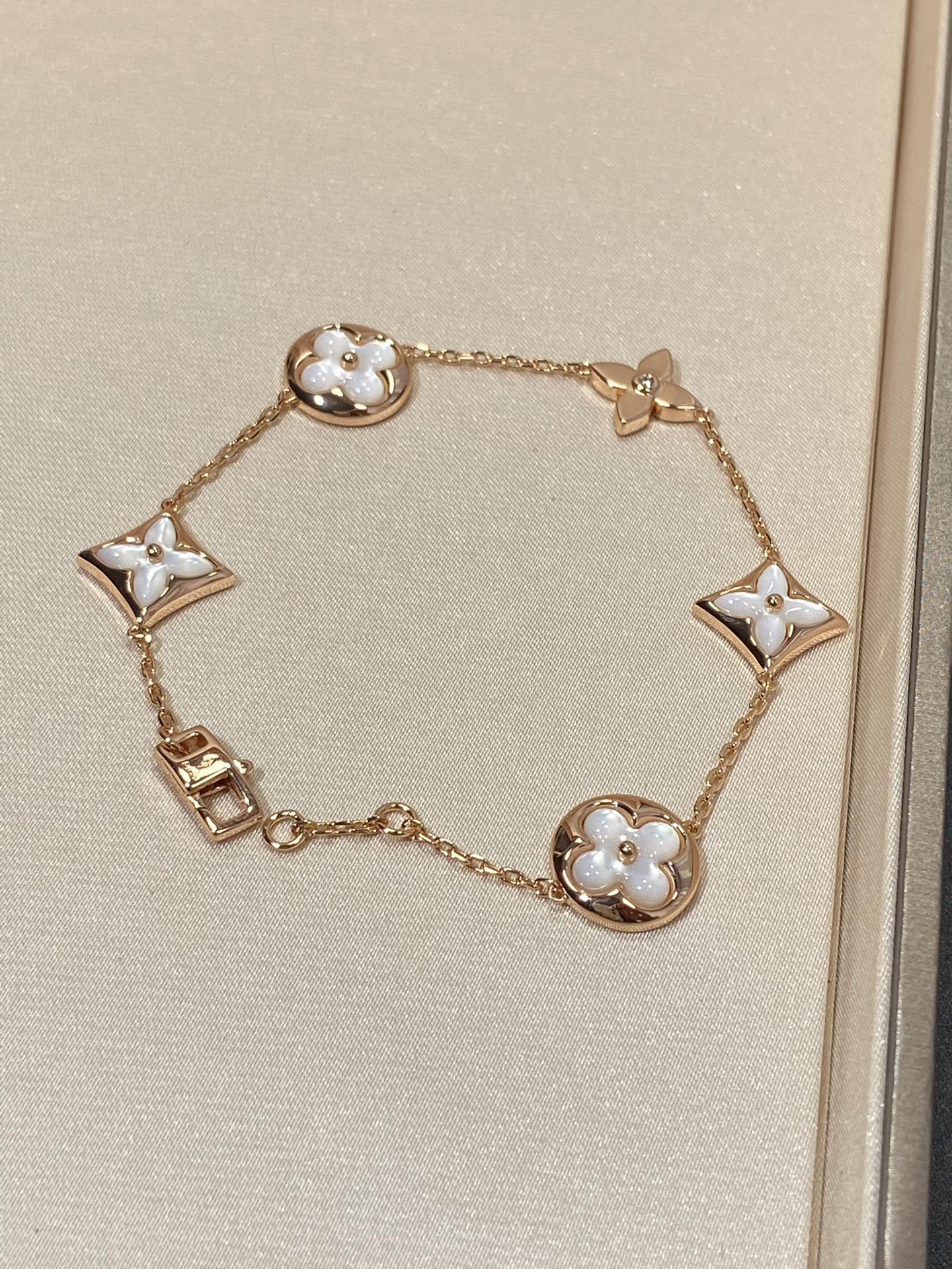 [Glimmer]STAR AND SUN 5 MOTIF MOP PINK GOLD BRACELET