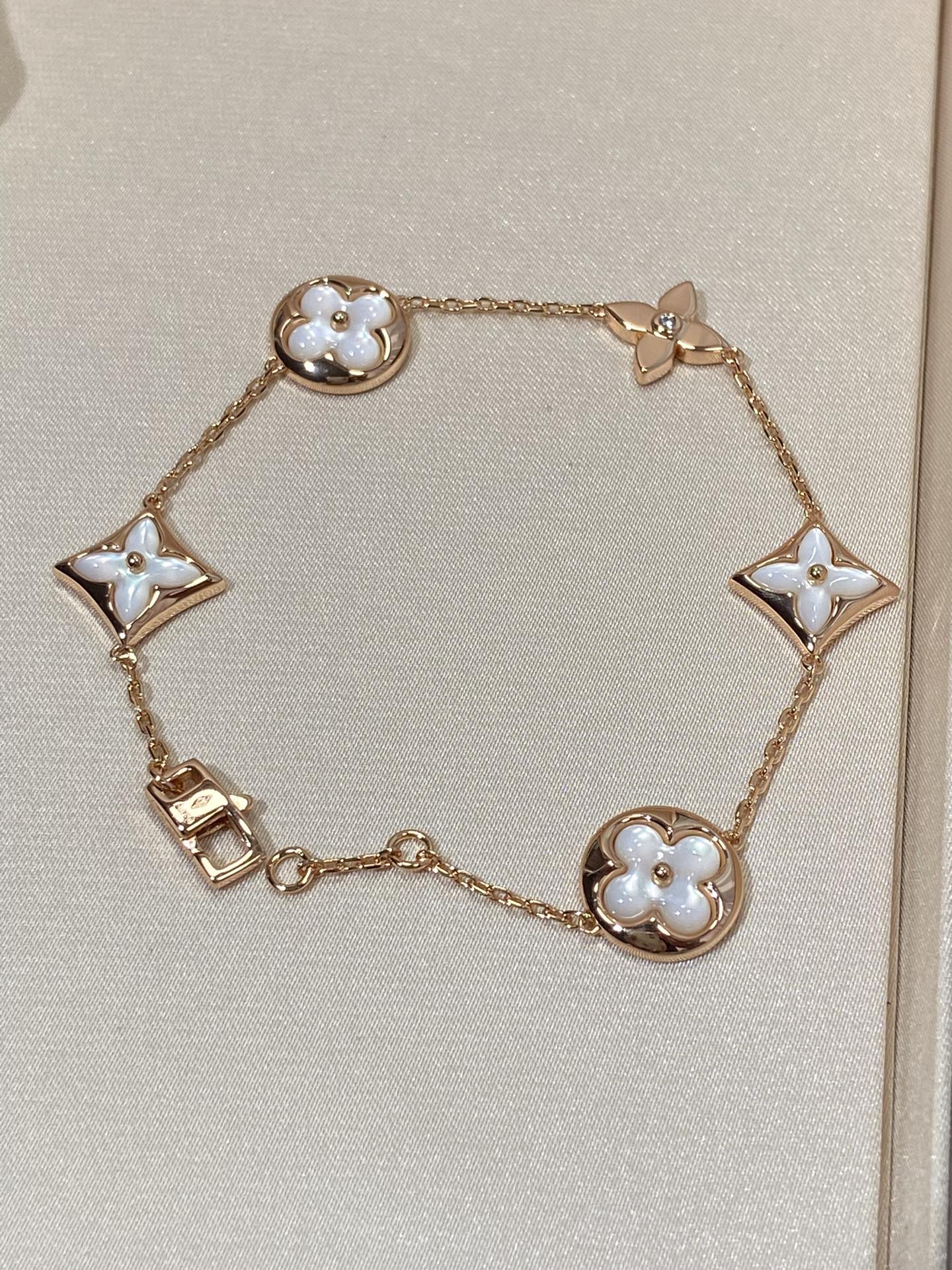 [Glimmer]STAR AND SUN 5 MOTIF MOP PINK GOLD BRACELET