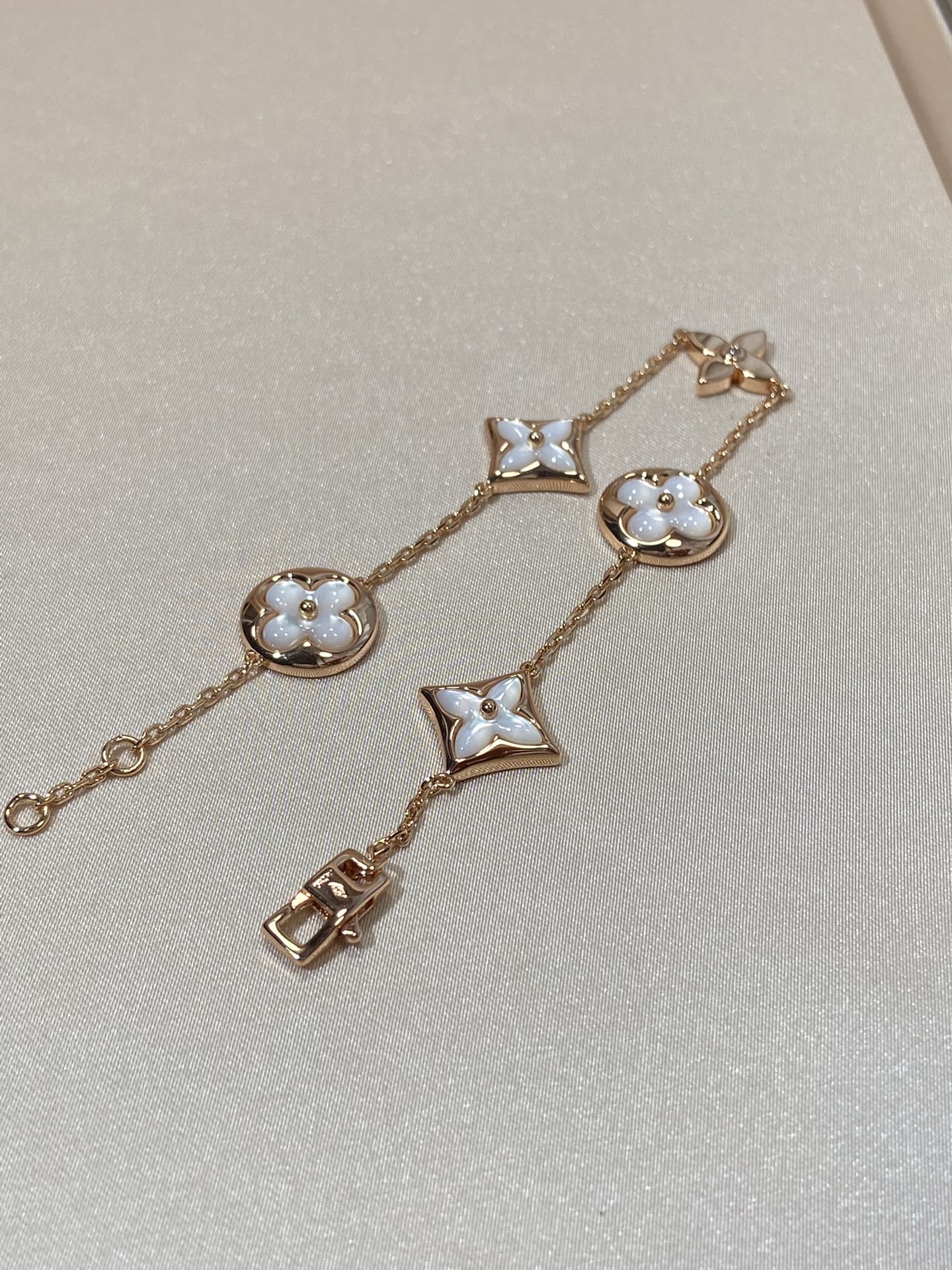 [Glimmer]STAR AND SUN 5 MOTIF MOP PINK GOLD BRACELET