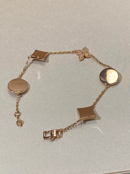 [Glimmer]STAR AND SUN 5 MOTIF MOP PINK GOLD BRACELET