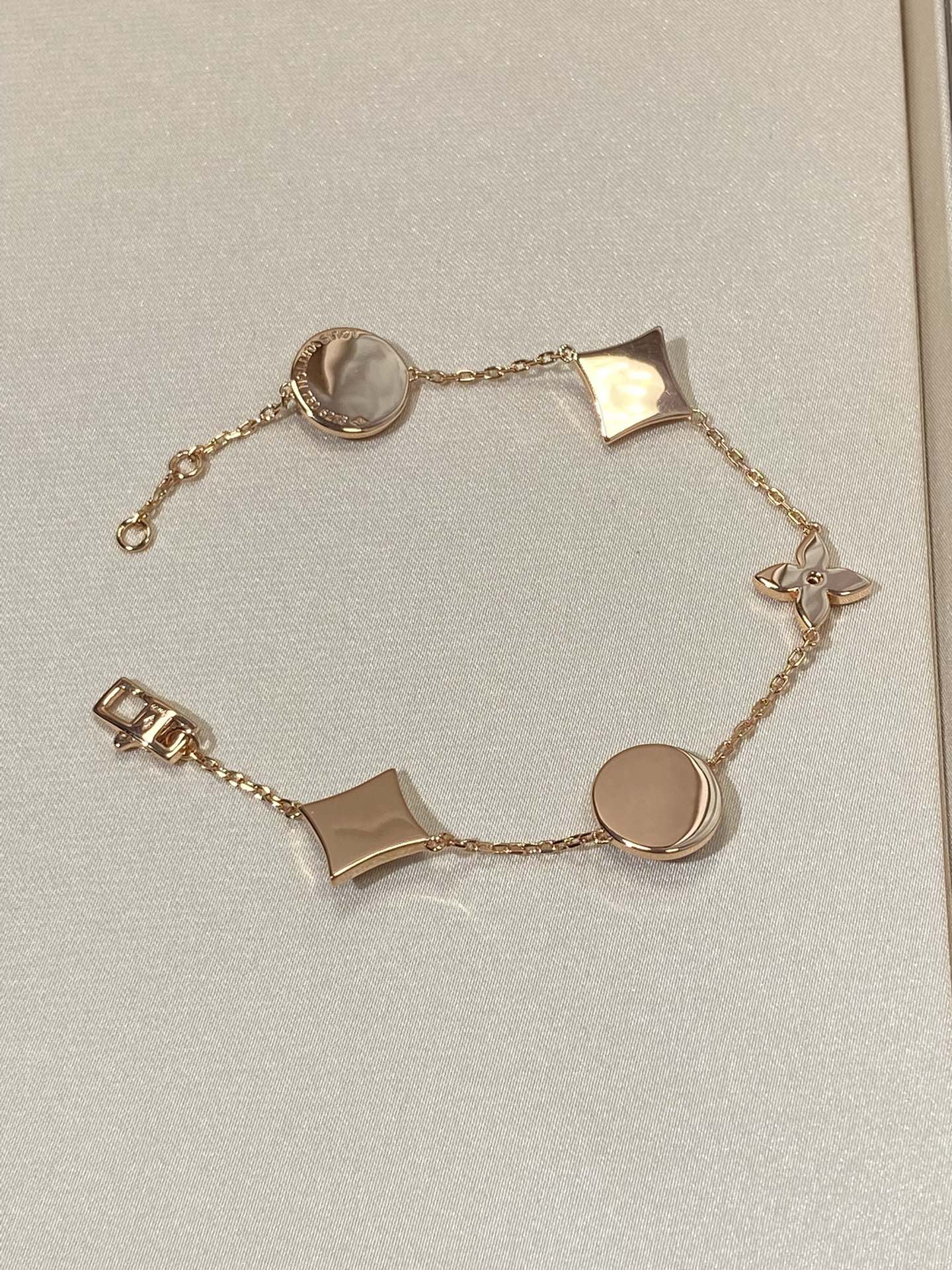 [Glimmer]STAR AND SUN 5 MOTIF MOP PINK GOLD BRACELET