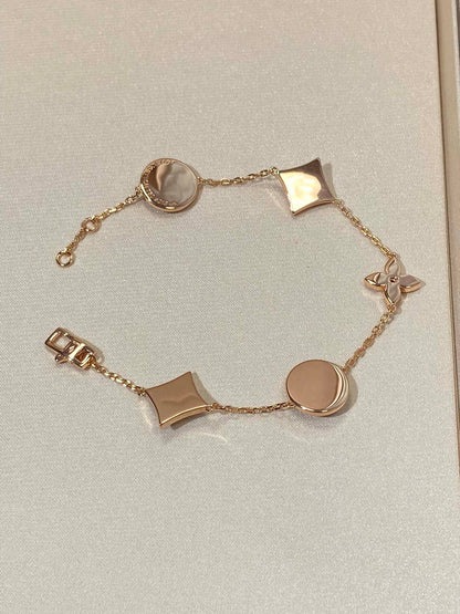 [Glimmer]STAR AND SUN 5 MOTIF MOP PINK GOLD BRACELET