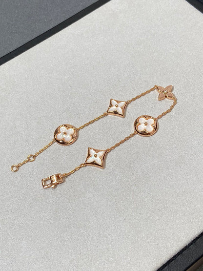 [Glimmer]STAR AND SUN 5 MOTIF MOP PINK GOLD BRACELET