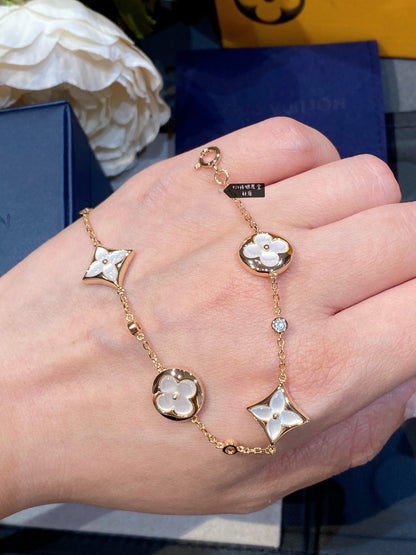 [Glimmer]STAR AND SUN 4 MOTIF WHITE MOP PINK GOLD BRACELET