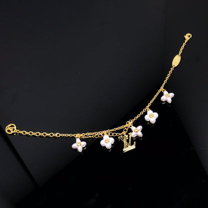 [Glimmer]LOGO 6 MOTIF STAR AND SUN GOLD BRACELET