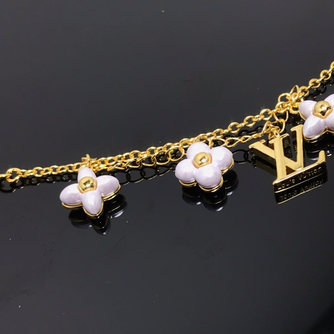 [Glimmer]LOGO 6 MOTIF STAR AND SUN GOLD BRACELET