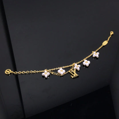 [Glimmer]LOGO 6 MOTIF STAR AND SUN GOLD BRACELET